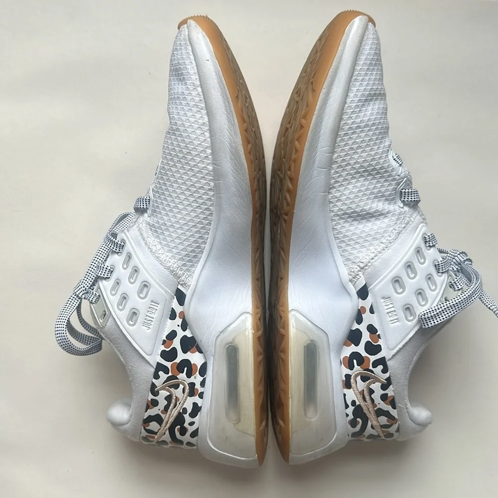 White Nike air max shoes, size 5 with gold Nike embroidering/cheetah print heal
